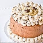 cookie dough layer cake on a cake plate