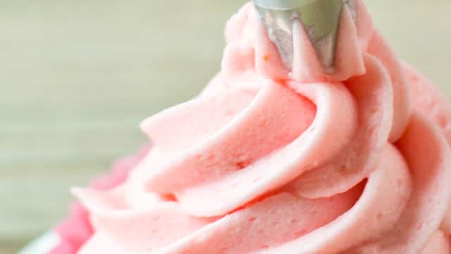 If you like strawberries, you'll quickly fall for this easy strawberry buttercream made simply with strawberry jam for a delicious strawberry flavor.