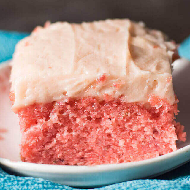 Craving a quick strawberry cake? This easy strawberry cake recipe uses shortcuts, but is intense in strawberry flavor and incredibly moist!