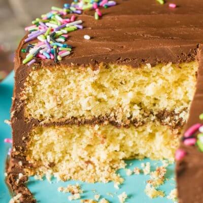 Homemade yellow layer cake with chocolate buttercream frosting