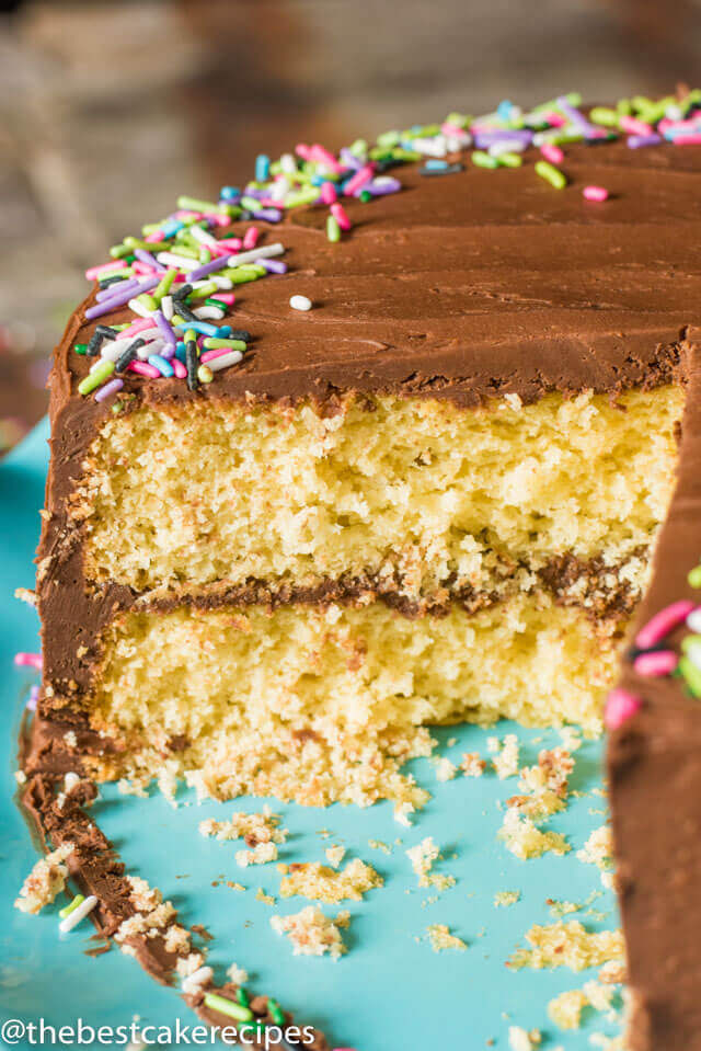 Homemade yellow layer cake with chocolate buttercream frosting