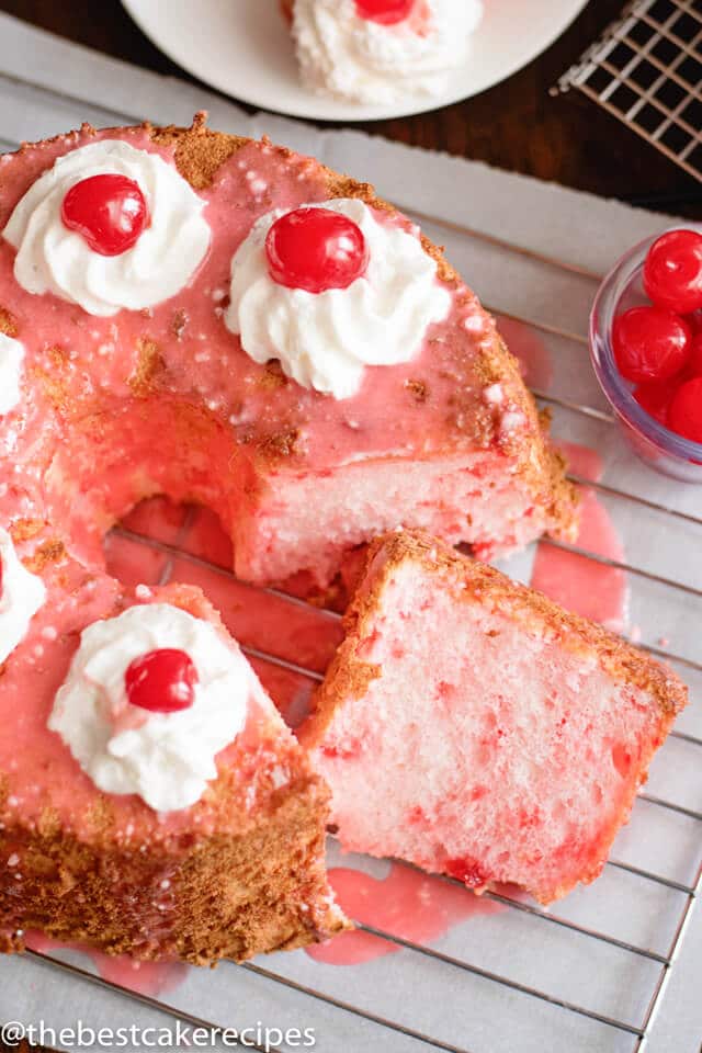cherry angel food cake with slices cut