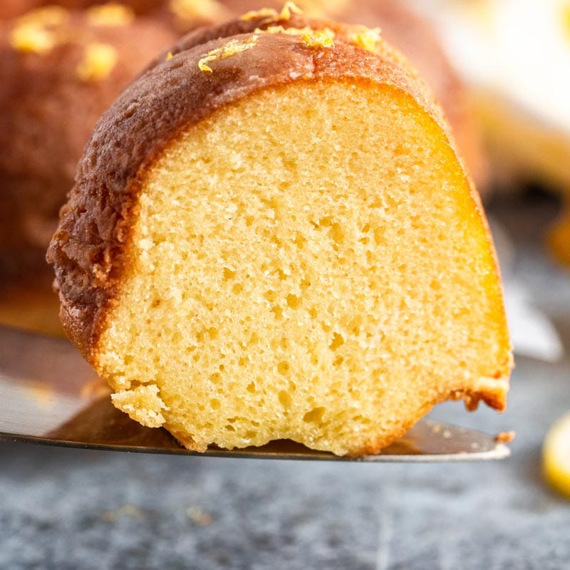 a piece of lemon bundt cake on a spatula