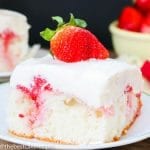 strawberry poke cake on a plate
