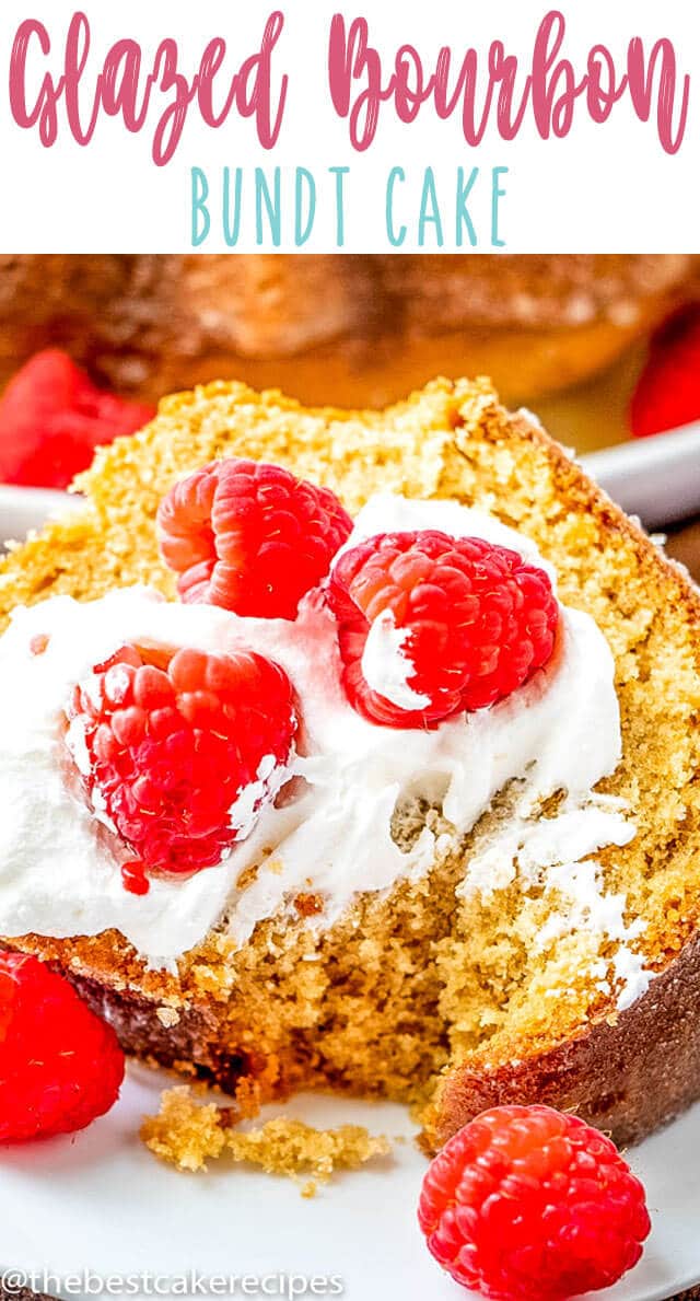 A slice of cake on a plate, with raspberries and whipped cream