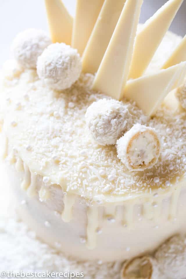 white cake decorated with raffaella and chocolate shards
