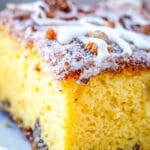 close up of fluffy yellow coffee cake with streusel