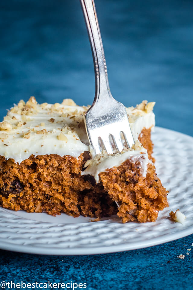 tomato soup cake on a plate with a fork