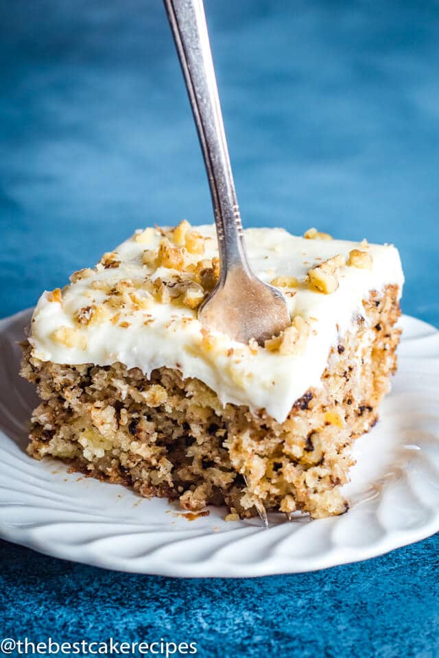 Walnut Pineapple Cake on a plate with a fork