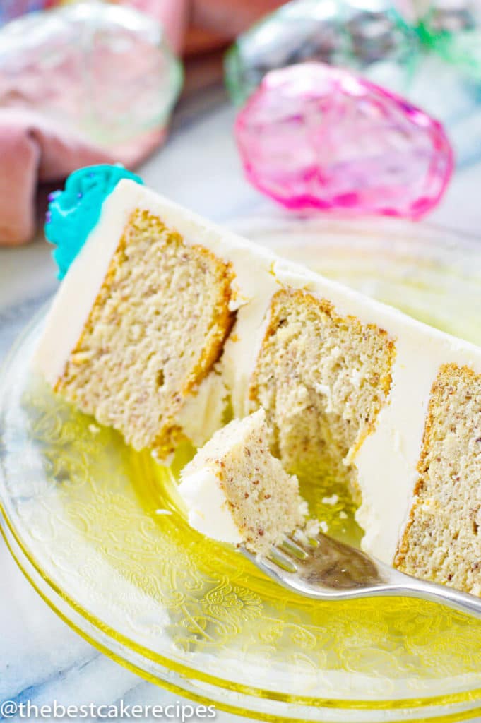 A piece of cake on a plate, with Buttercream