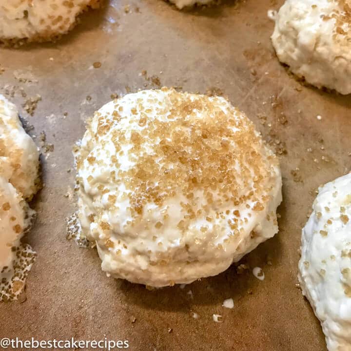 homemade biscuits with sugar on top on a baking sheet