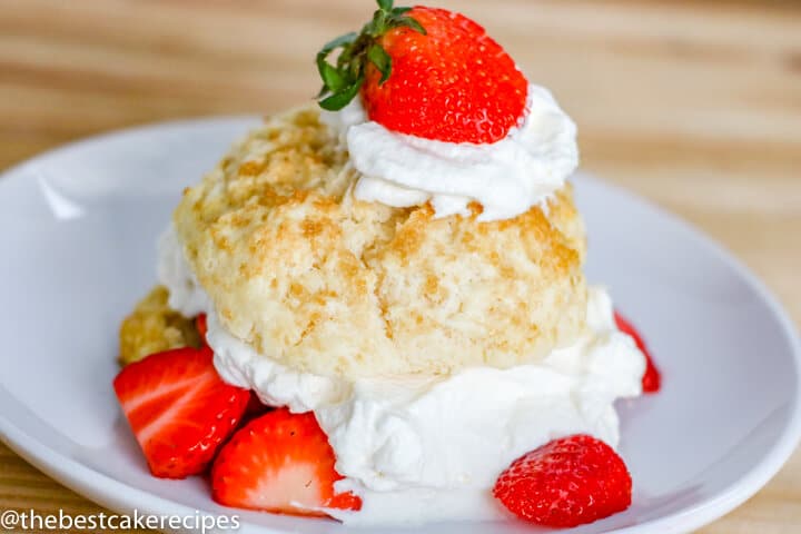Homemade Strawberry Shortcakes with whipped cream on a plate
