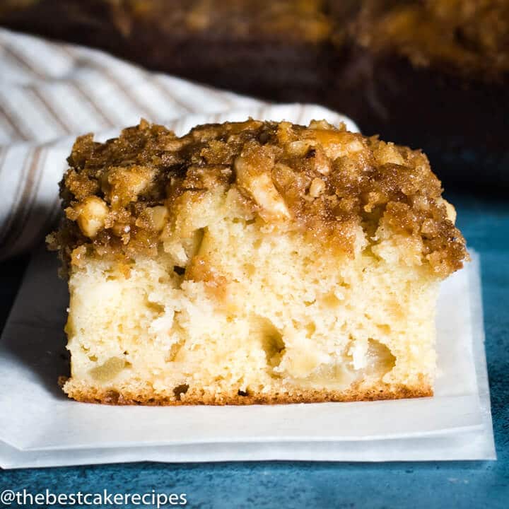 apple nut breakfast cake on a piece of parchment paper