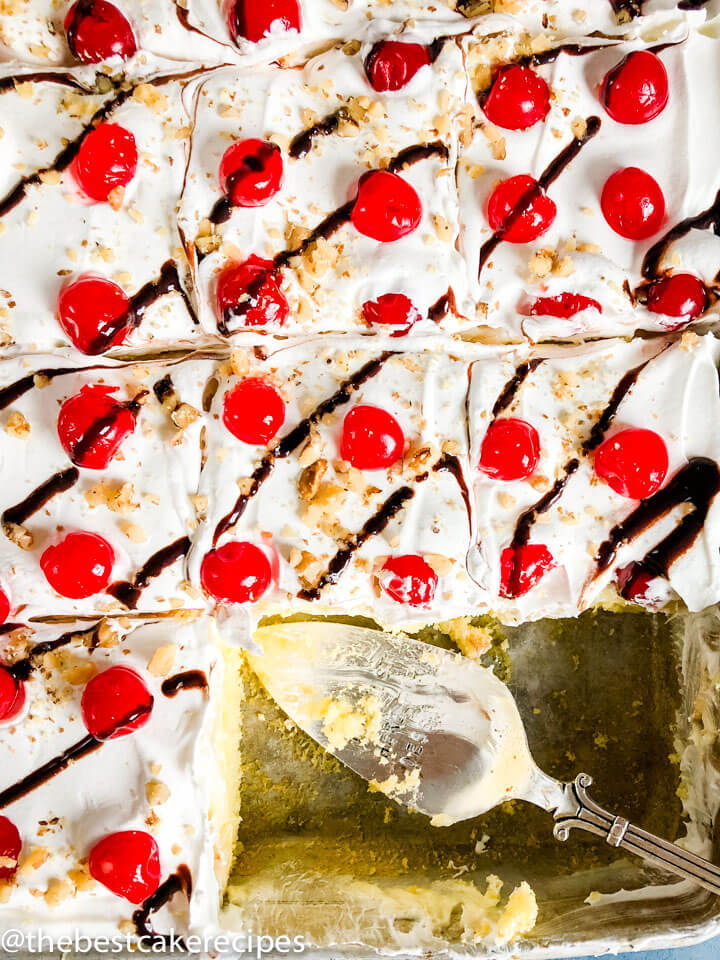 Banana Split Cake Recipe overhead shot with two slices missing