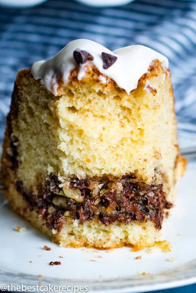 piece of chocolate chip filled bundt cake on a plate