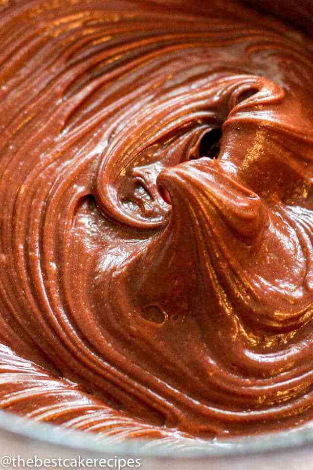 Sour cream chocolate frosting in a mixing bowl