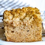 cinnamon crumb cake with topping on a plate