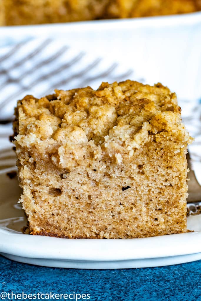 cinnamon crumb cake with topping on a plate