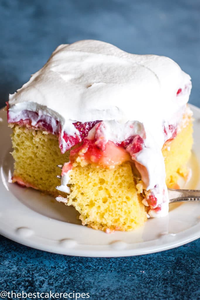 Strawberry Pudding Cake with fork on a plate