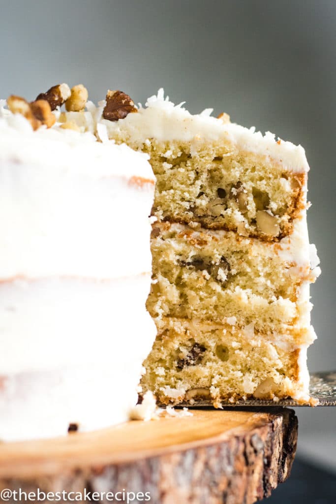 3 layer walnut cake on a spatula