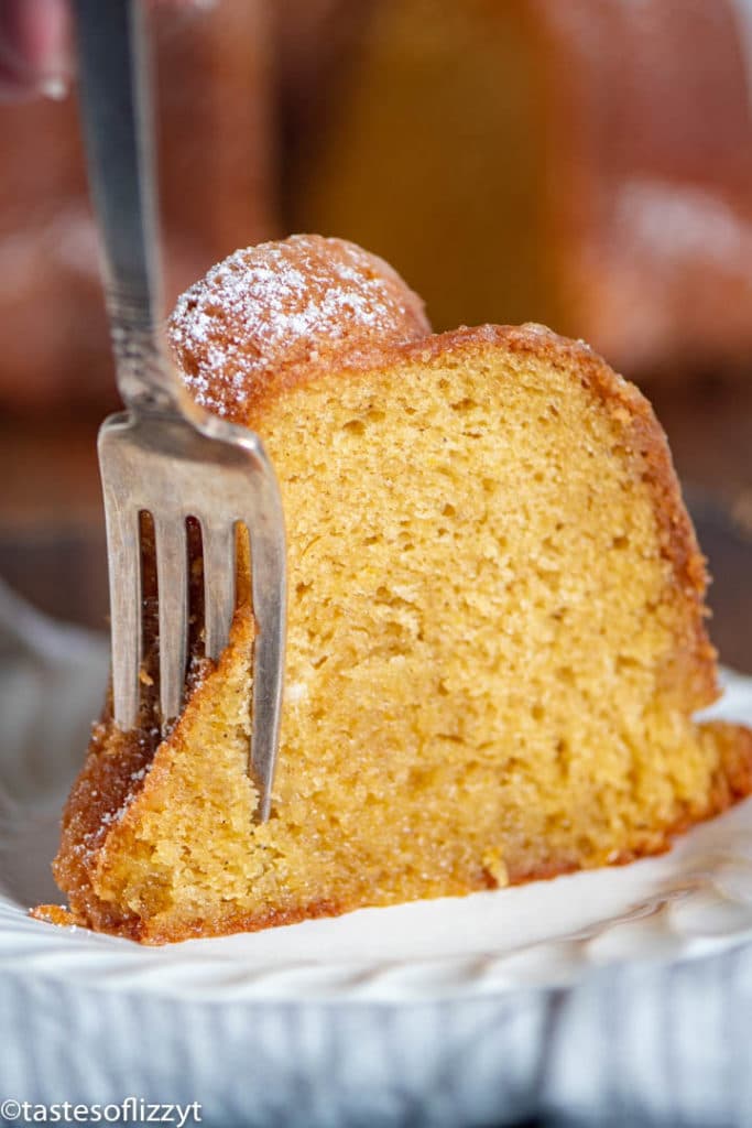 slice of Crack Cake Recipe on a plate with a fork