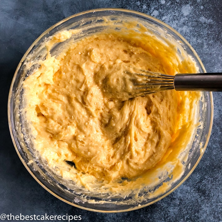 crack cake batter in a bowl