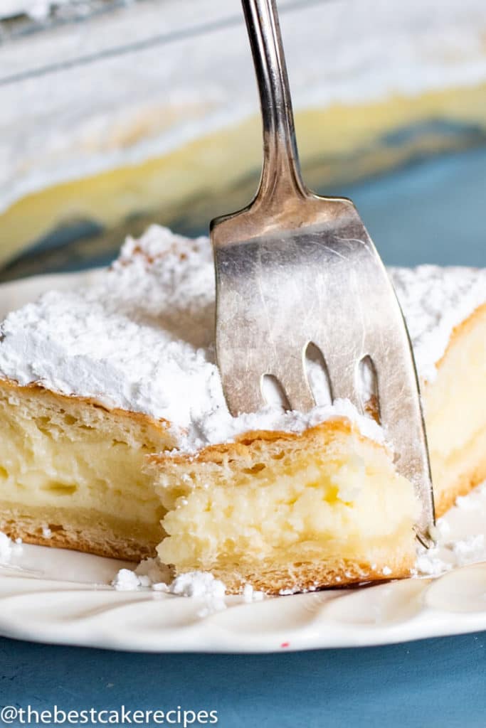 Crescent Roll Breakfast Cheesecake on a plate with fork