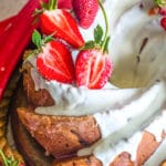 Strawberry Rhubarb Bundt Cake with glaze and strawberries