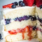 sliced open 3 layer berry cake