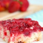 Easy Strawberry Upside Down Cake with fresh fruit on a plate