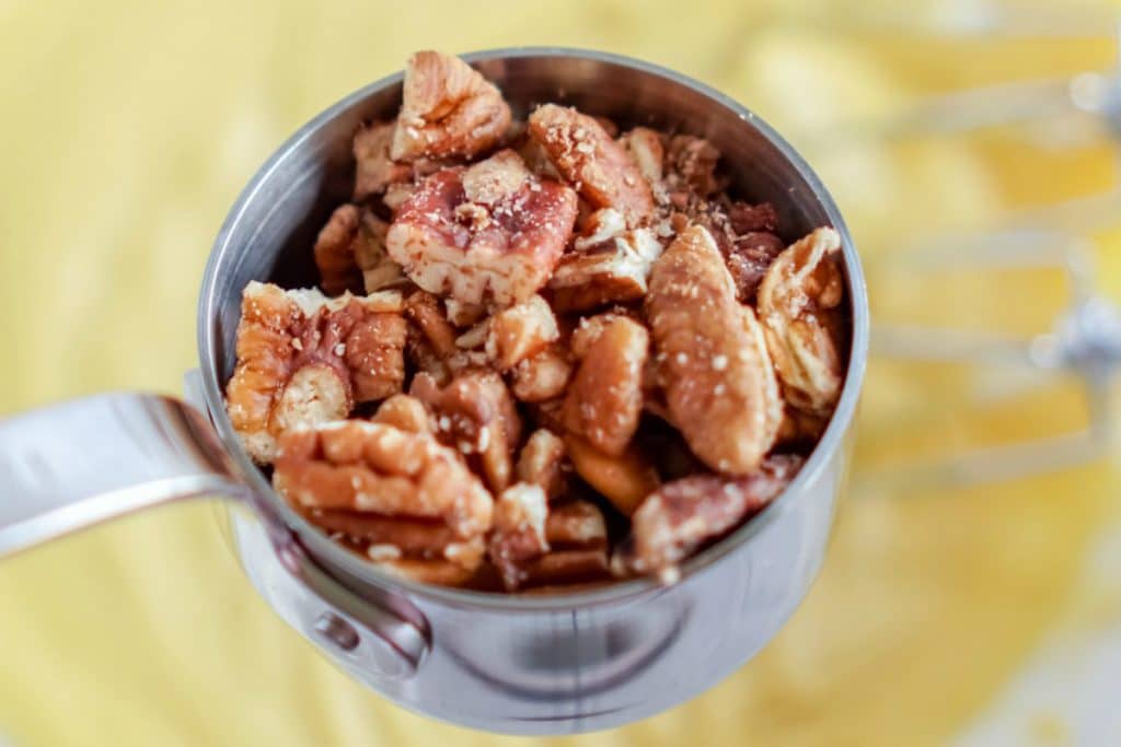 pecans in measuring cup