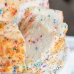 slices of funfetti angel food cake on a plate