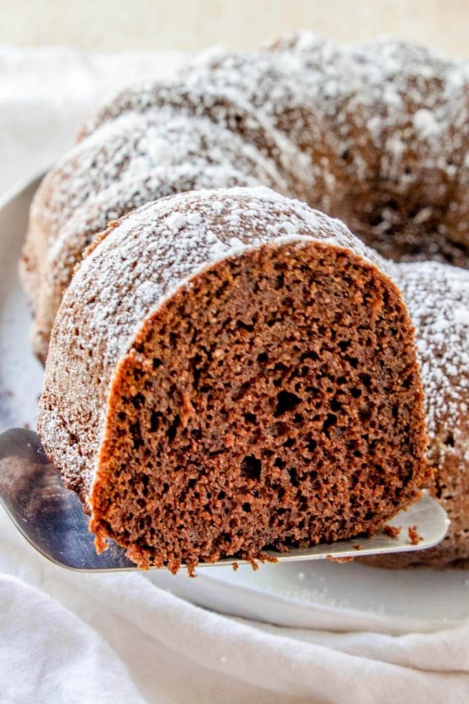 slice of Pumpkin Chocolate Bundt Cake on a spatula