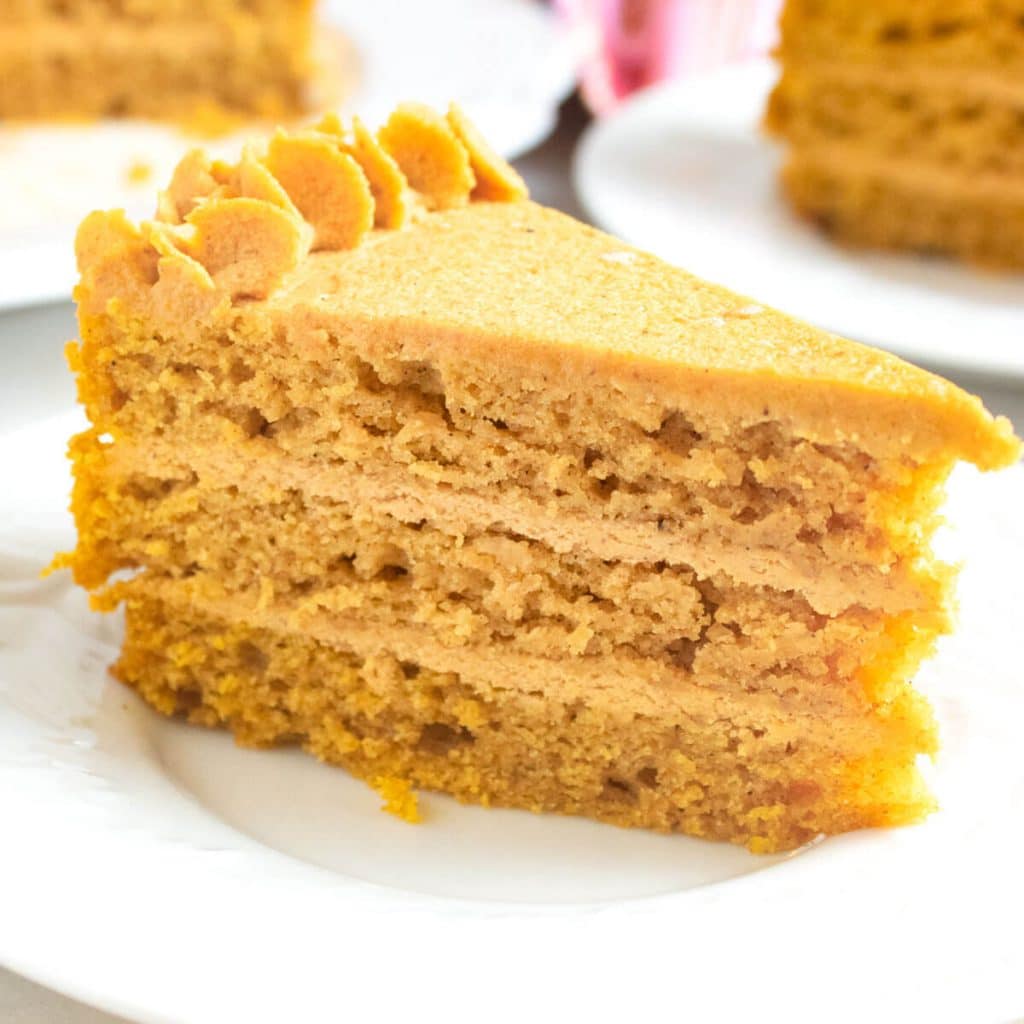 piece of Pumpkin Cake with Pumpkin Ganache on a plate