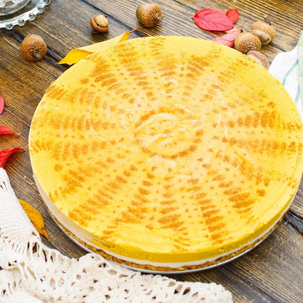 Vegan Pumpkin Pie with doily pattern
