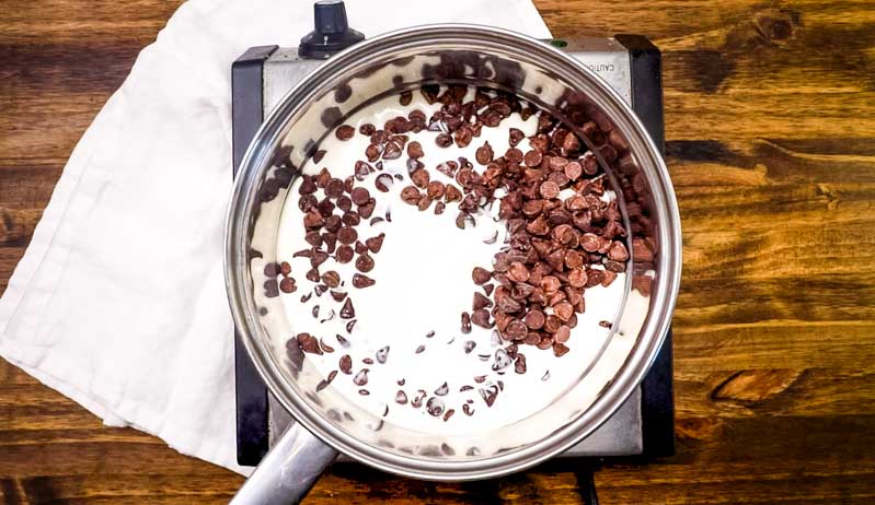 chocolate chips and heavy cream in a pan