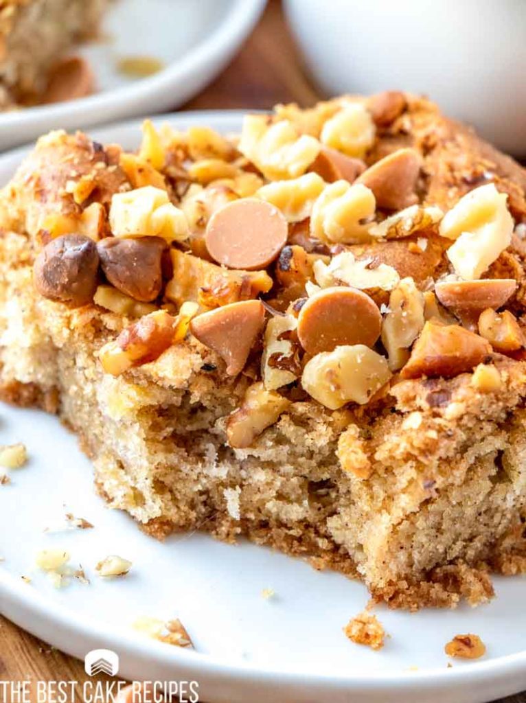 cake with butterscotch chips and walnuts on a plate