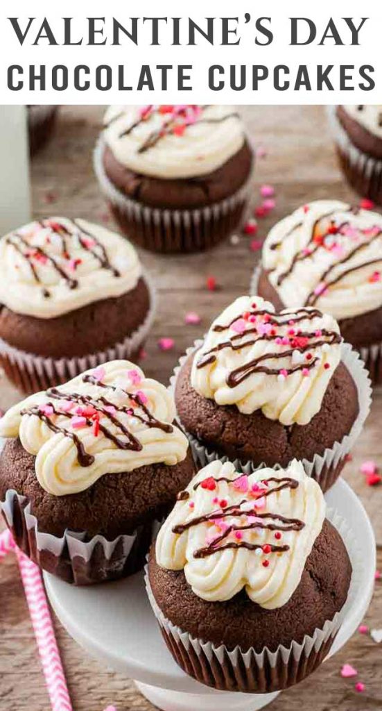 pile chocolate cupcakes with white frosting