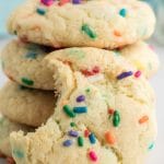 stack of Cake Mix Cookies, one with bite out