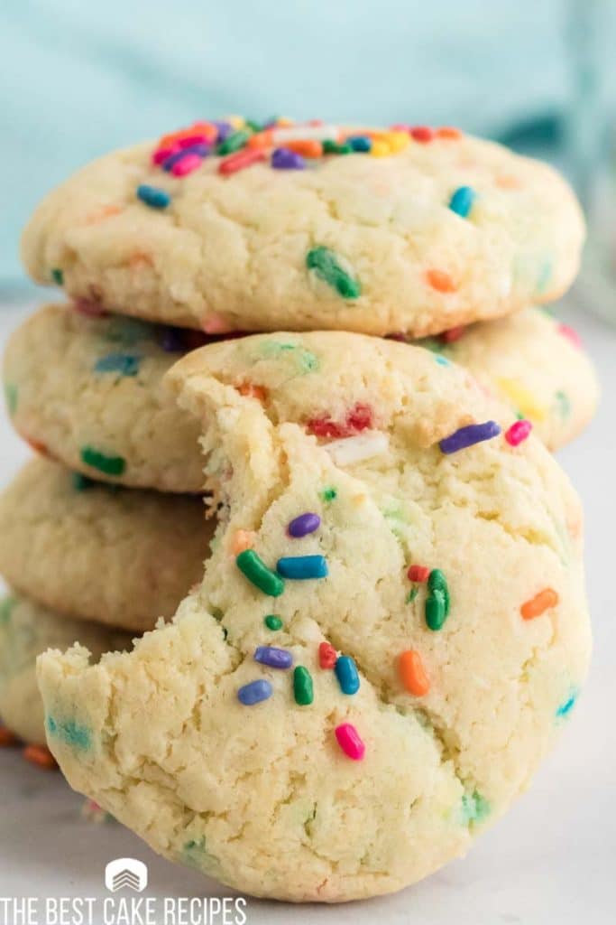 stack of Cake Mix Cookies, one with bite out