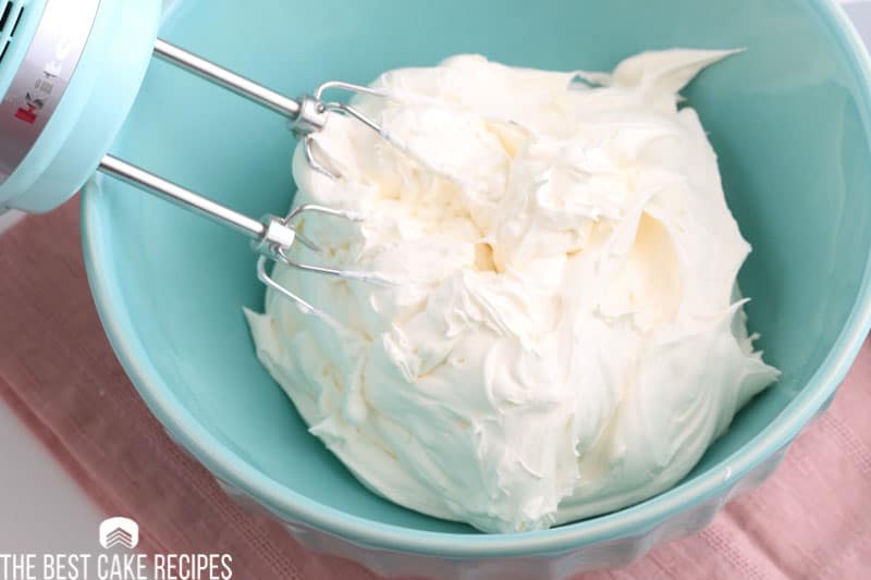 marshmallow fluff frosting in a bowl with mixer