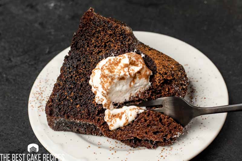 chocolate cake with whipped cream on a plate