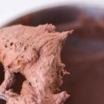 chocolate frosting on a stand mixer paddle