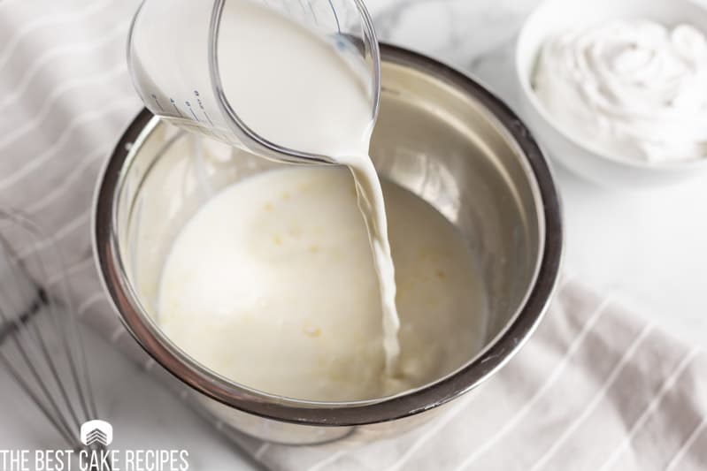 milk pouring into bowl
