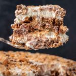 slice of chocolate chip cookie icebox cake on a spatula