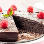 chocolate cake with raspberries on top