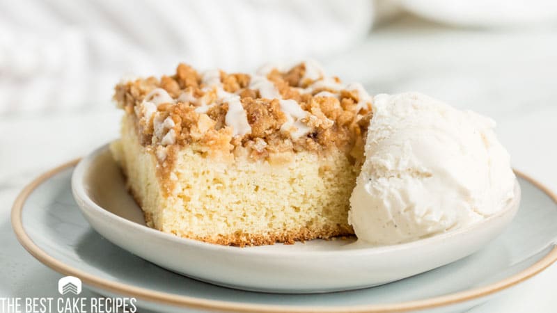 apple crumb cake with ice cream on a plate