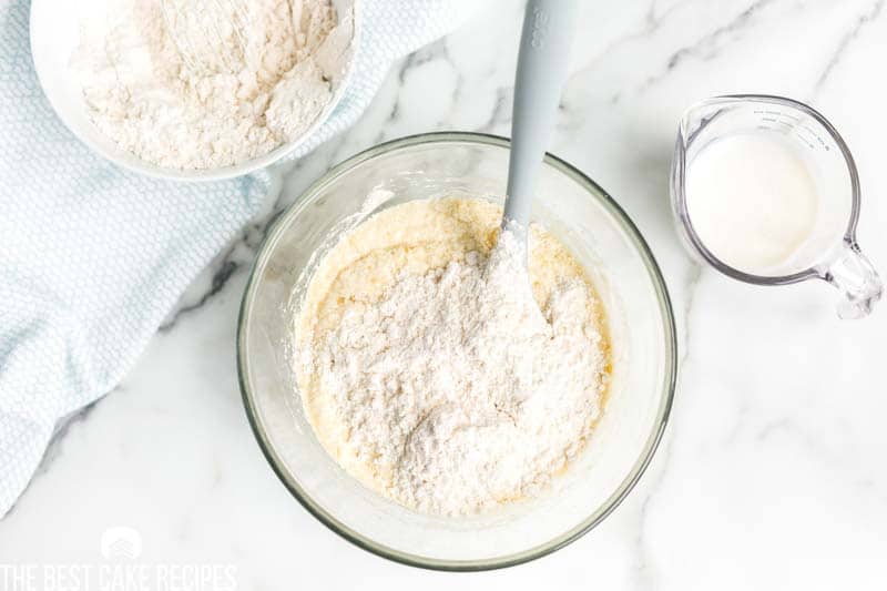 mixing flour into wet ingredients