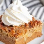 slice of pumpkin cake with whipped cream