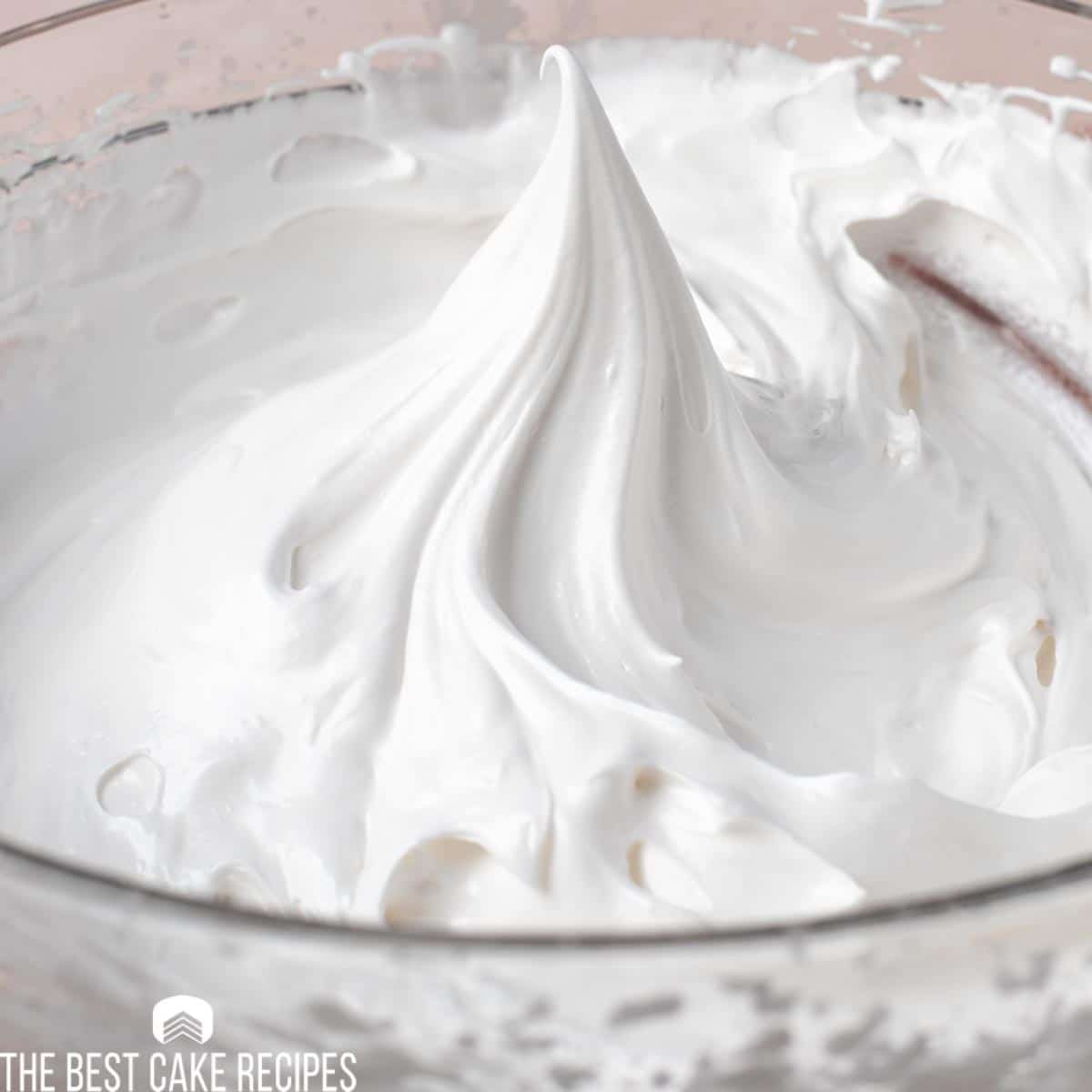 white whipped frosting in a peak